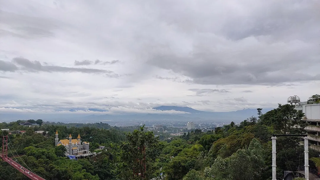Bandung viewed from Pagerwangi, Lembang during a cloudy day with Mount Malabar in the background
