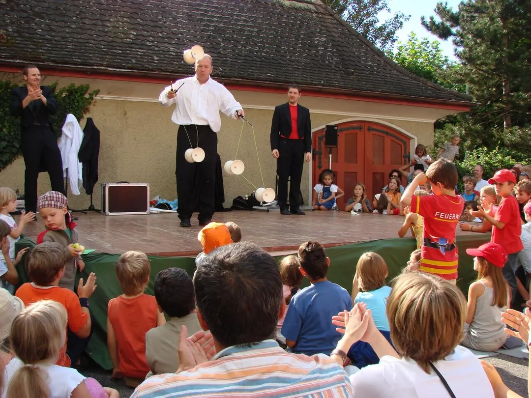 Three jugglers at a street artist festival in Lenzburg (Switzerland)