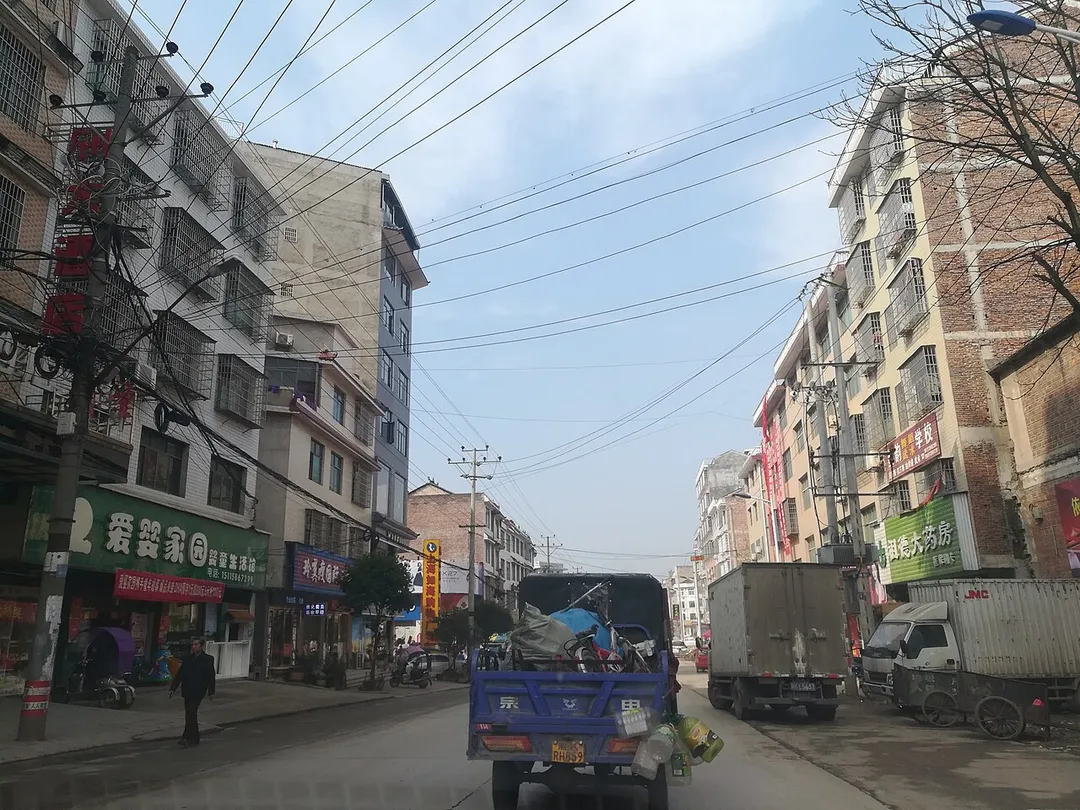Residential buildings on both sides of the road in Yangshi Town, Lianyuan, Hunan, China.