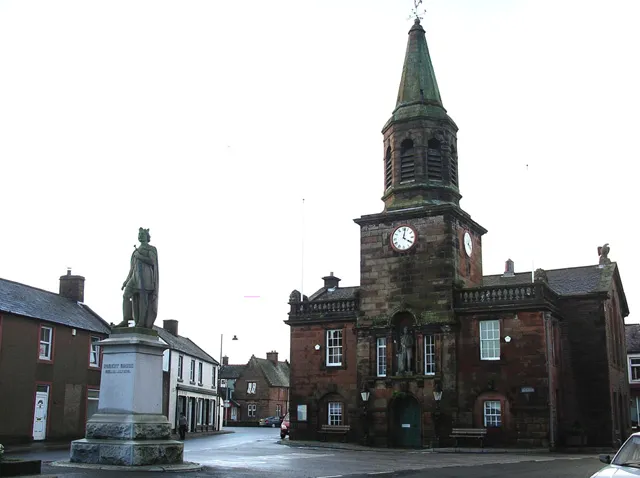 Lochmaben town centre, Dumfries and Galloway; the large building with spire is the town hall, the statue represents King Robert I (aka Robert the Bruce)