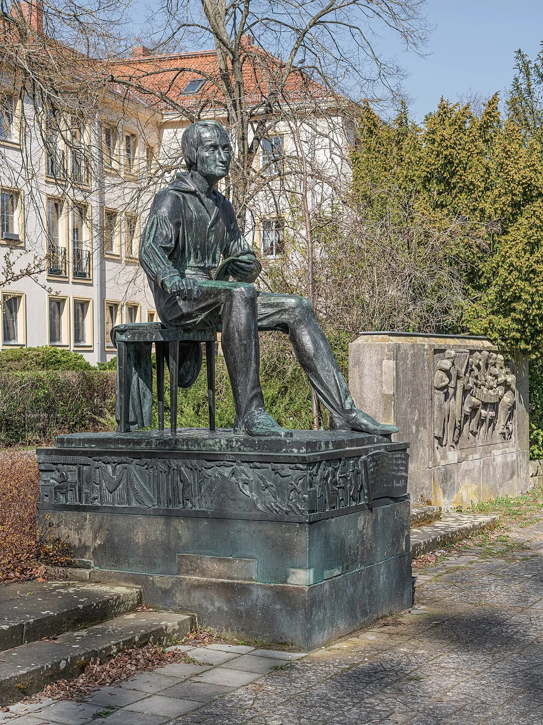 Heinrich Heine Square with monument to Heine in Ludwigsfelde, Brandenburg, Germany