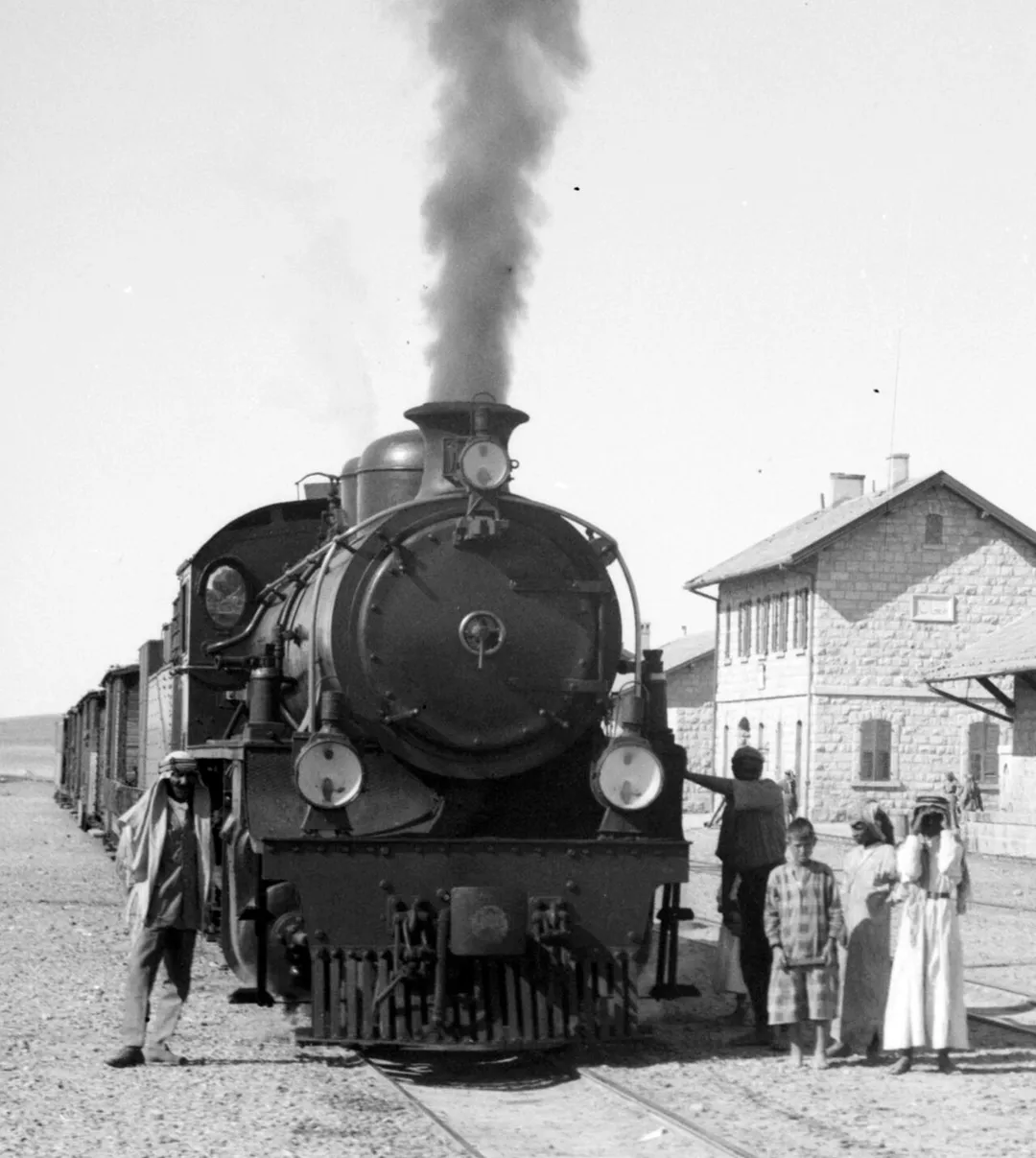 Narrow-gauge (1050 mm) steam locomotive of the Transjordanian Railways at el-Ma'an near Petra, Jordan, pre 1920.  Crop from a stereogram original.
