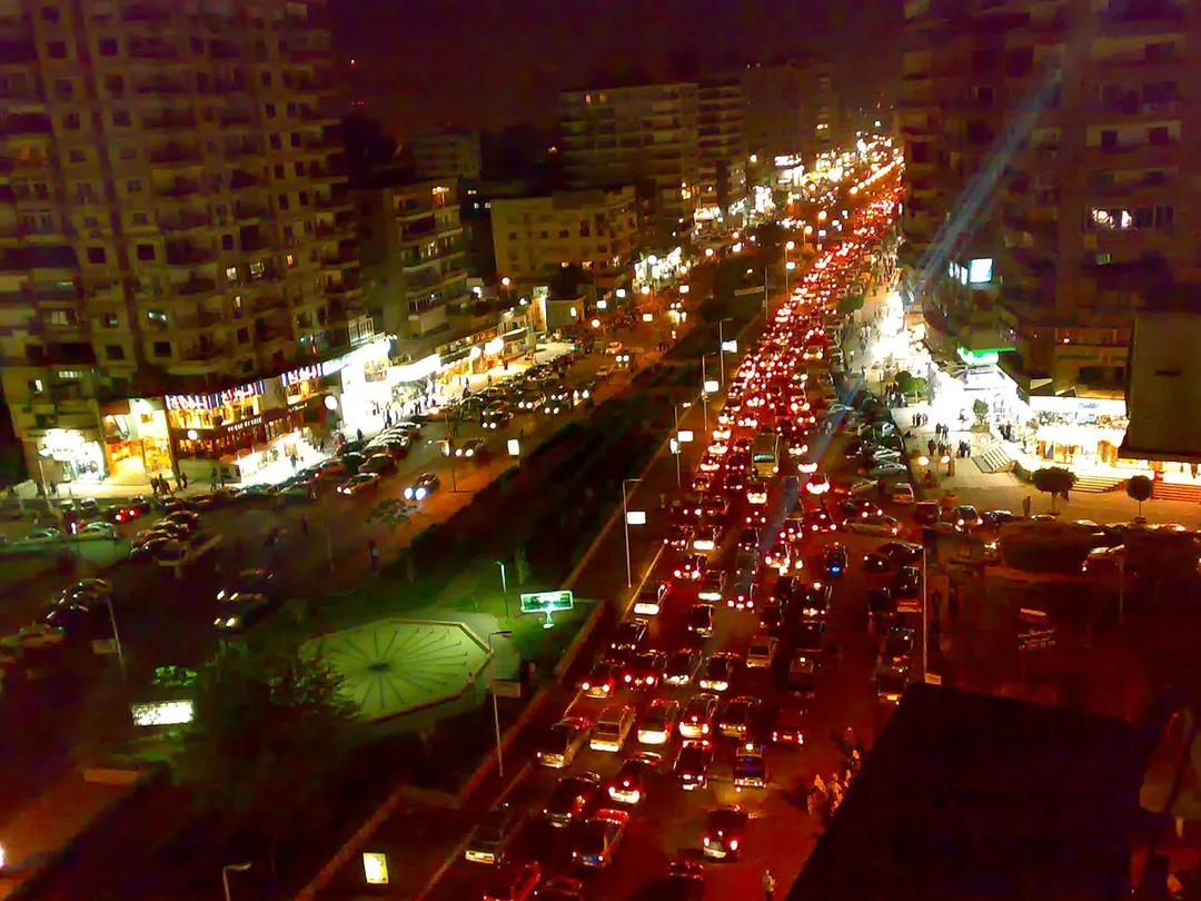 Abbas El Akad Street in Nasr City, Greater Cairo, at night with a traffic jam.