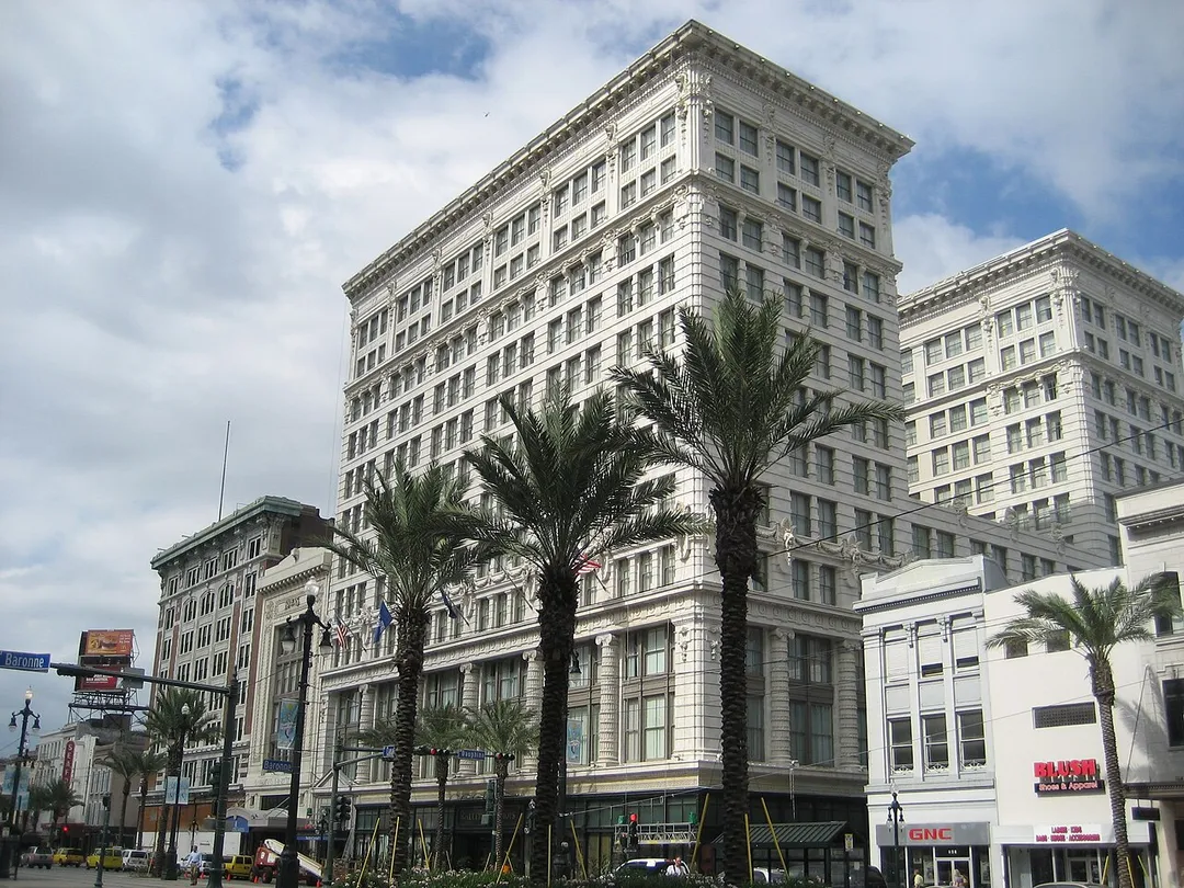 New Orleans: Canal Street, Central Business District. View of the Maison Blanche Building. Built in 1908-1909, for generations it housed a leading local department store on the lower floors and offices on the upper.  The building now houses the Ritz-Carleton Hotel.
