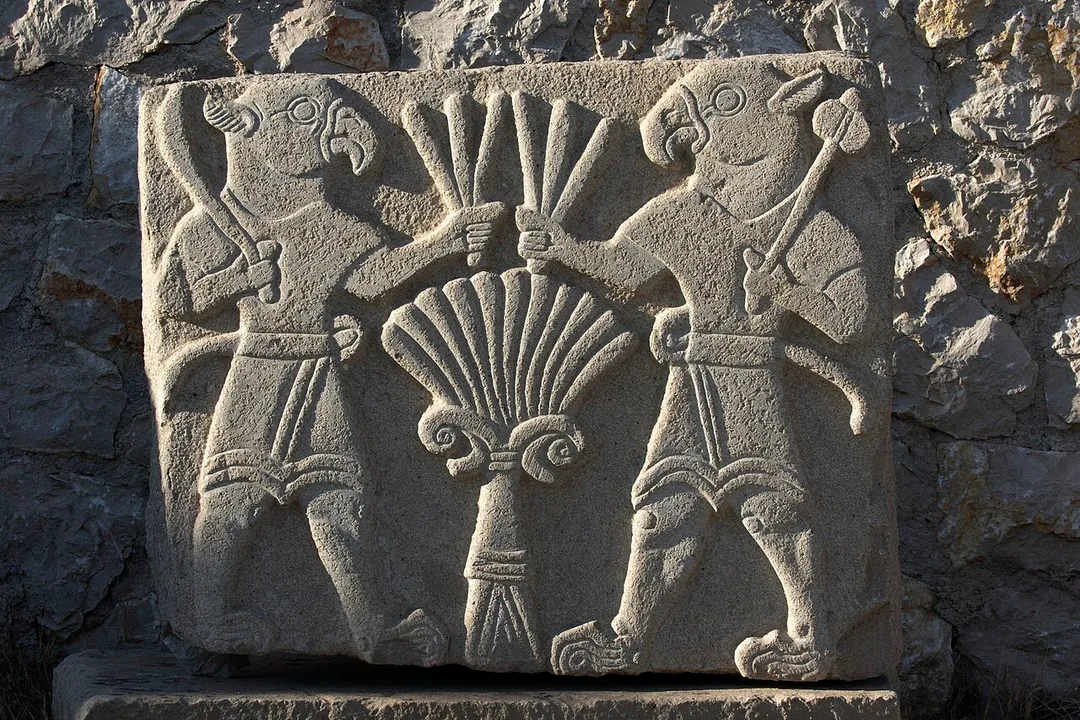 Carving of "Two lionmen" (1200 BCE)at the entrance of Arslantepe Ruins area. Battalgazi, Malatya - Turkey.