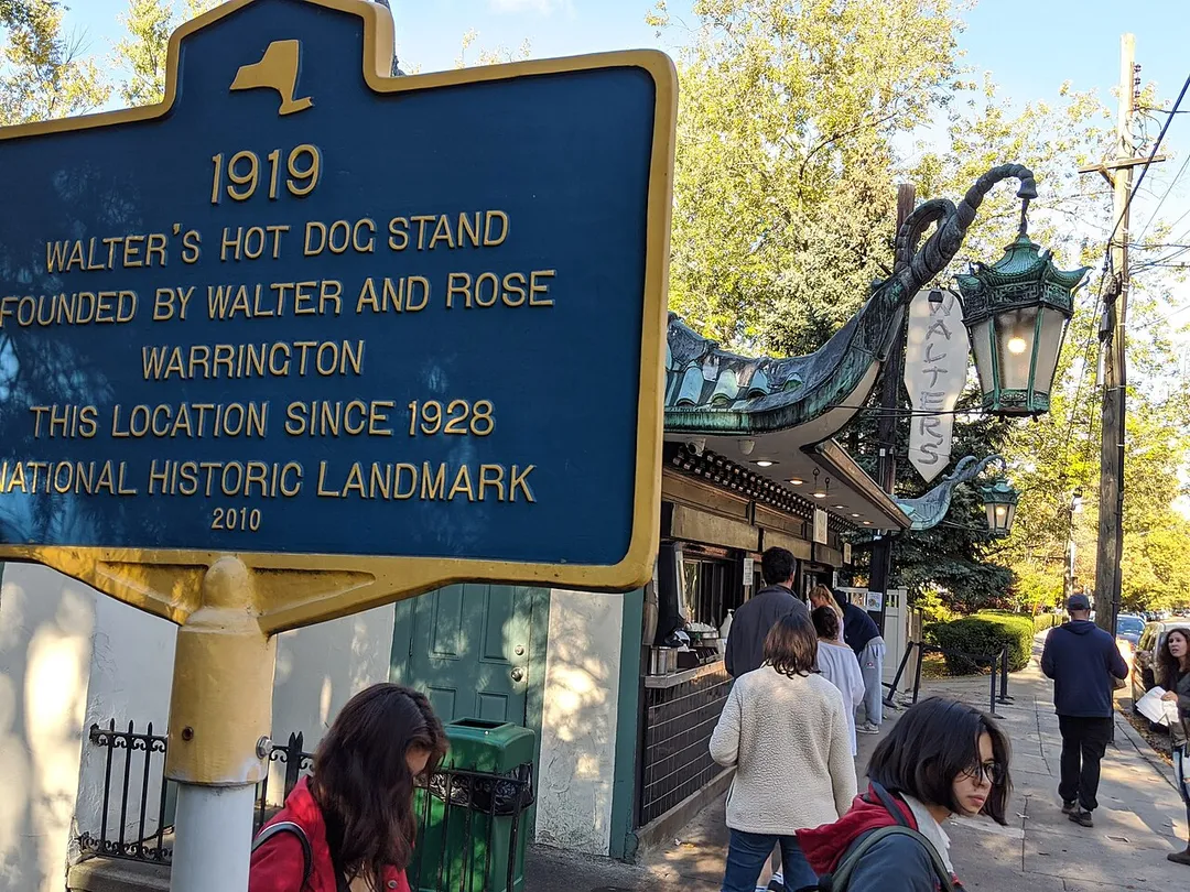 Walter's Hot Dog Pagoda. Walter's is a family business founded in 1919 by Walter Warrington in Mamaroneck, NY. The Palmer Avenue building has a pagoda-style copper roof, now oxidized to a light green, and dragon lanterns.