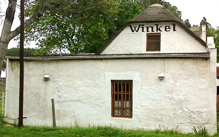The Mission Station which is an important place of interest because of both its history and its architectural beauty, was founded in 1808 by the Moravian missionaries Kohrhammer and Schmidt under the auspices of Governor Lord Caledon on the site occupied by the Dutch East India Company's military and cattle outpost, “t Groenekloof", founded by Dutch Governor Simon van der Stel in 1679. The site houses the original church building still used today for the same purpose, the “Kleine (Little) Post” military outpost converted to a parsonage, mission houses now used as clerical buildings, a 1935 school house still used for this purpose, the historic shop used as a restaurant, the historic water mill restored and used as a local museum, a slave tree, a reed and thatch historic house, historic bakery with replica outside oven and a more recently constructed community hall.