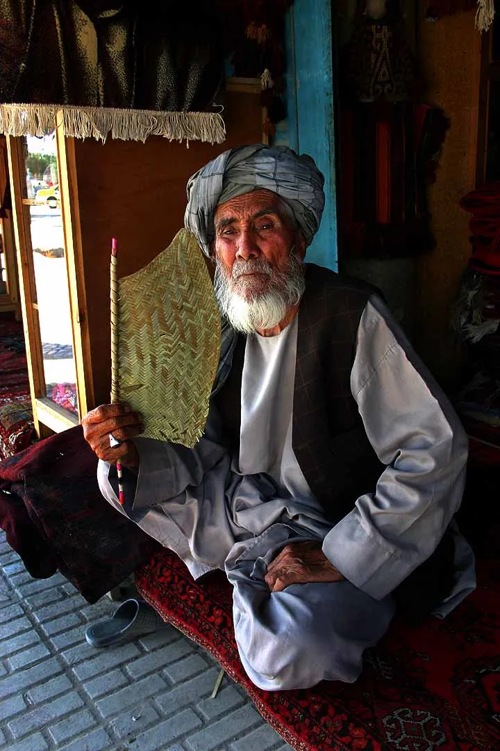 Carpet seller in Mazar-e-Sharif, Afghanistan.

Canon EOS Digital Rebel / 18-55mm Canon lens