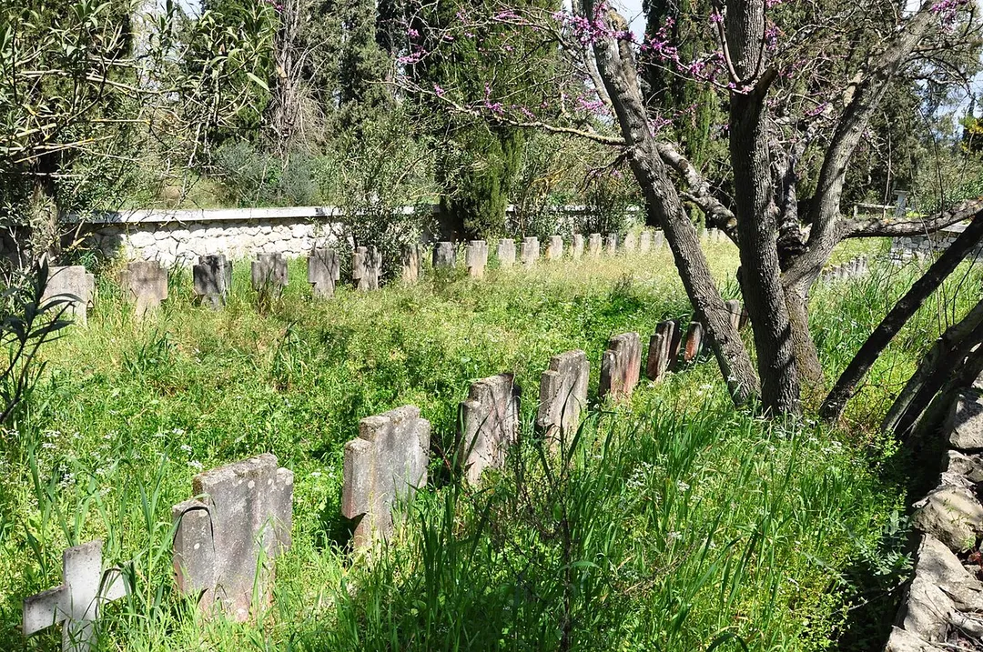 The mass grave of Greek solders of Adolf Hitler, "Security Battalions", Meligalas, Peloponissos, Greece, 18th of September 1944. The anglo-greek commission has found the total of 707 bodies, men only, in 1946. But the present marble plaques are commemorating the total of 1.120 persons, over 30 of them propably civilians, propably killed during 3 day's fights (there is no detailed info). The Greek Government, participated in the memorial services, from 1949 to 1974. For many years, the official version was, that decent people had been shot here, by the very bad communist partizans. No more officials here, now.