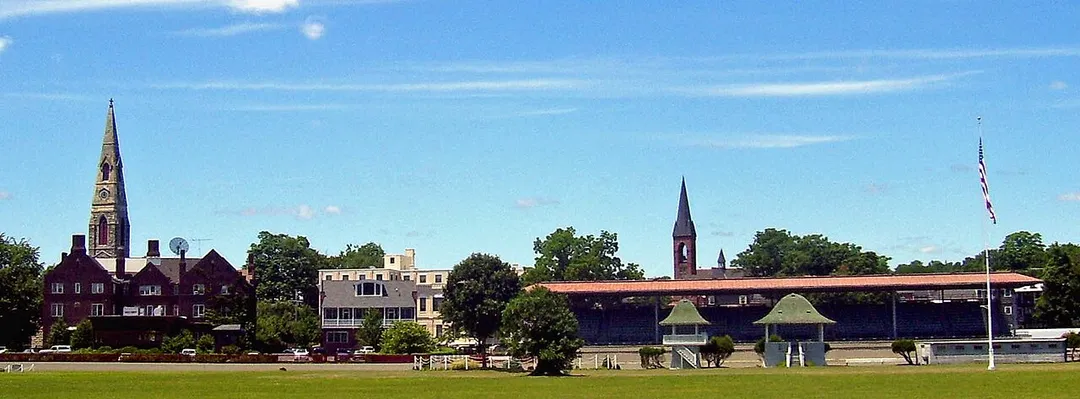 First Presbyterian Church, Goshen United Methodist and other buildings of downtown Goshen, NY, USA from the back stretch of the Historic Track.