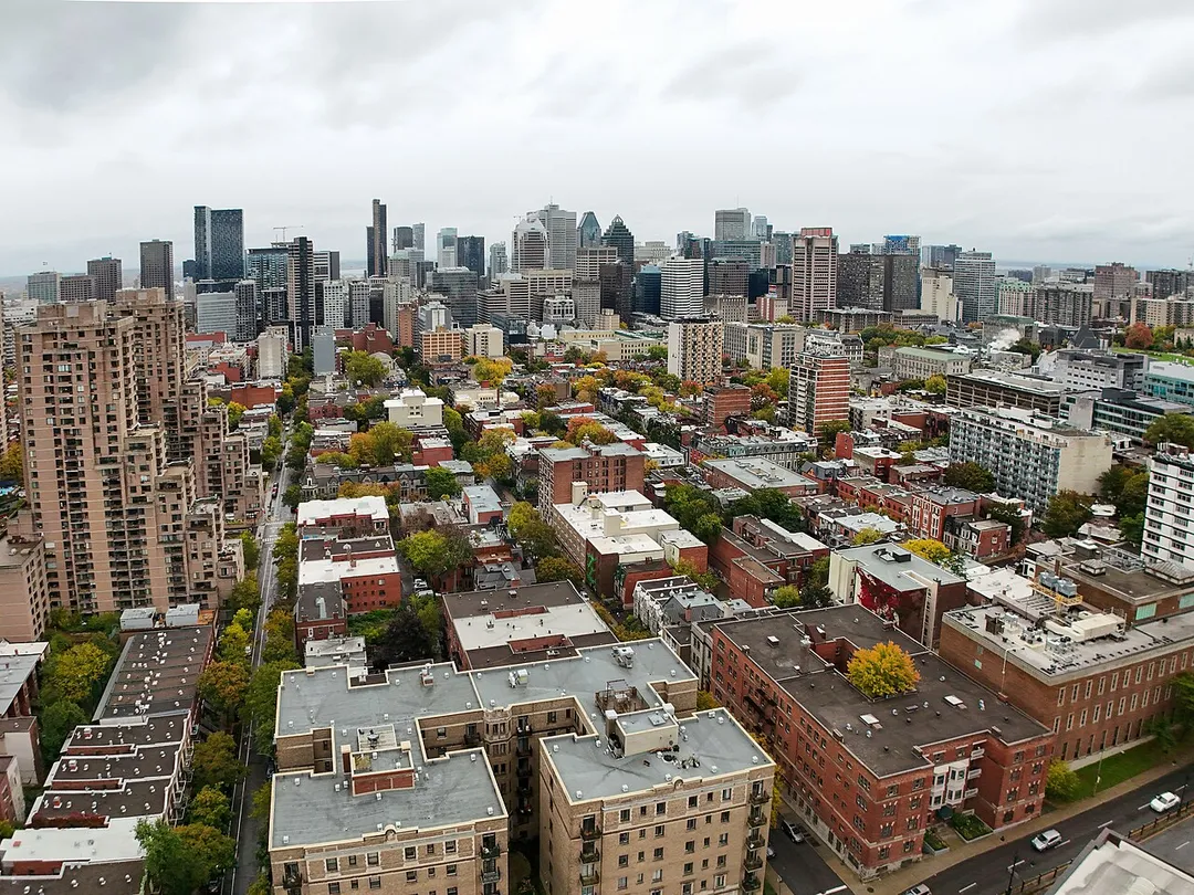 Downtown Montreal skyline rising above the Milton-Parc neighbourhood (nicknamed the “McGill Ghetto”)