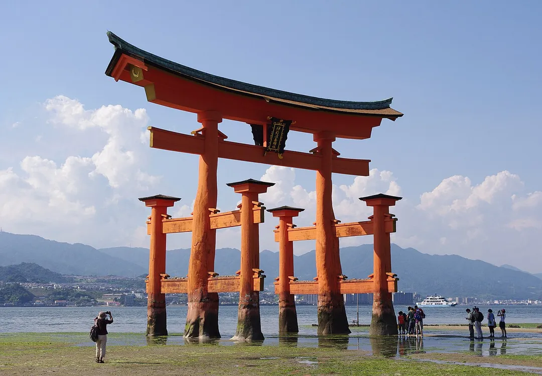 The floating torii gate of the Itsukushima Shrine in Japan, during low tide.