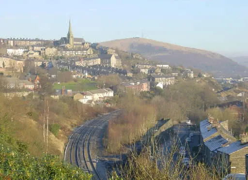 A view of Mossley in Greater Manchester, England looking north from near Mossley Station, towards Roughtown Church and Milton