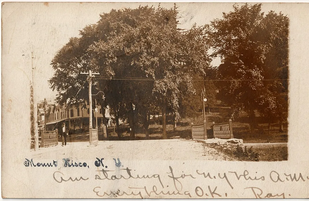 Man crossing a footbridge in Mount Kisco, New York in approximately 1908