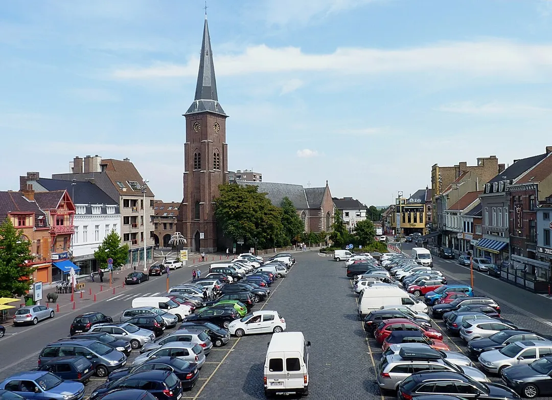 The town square of Mouscron, Belgium, on the background, the church Saint Bartholomew.