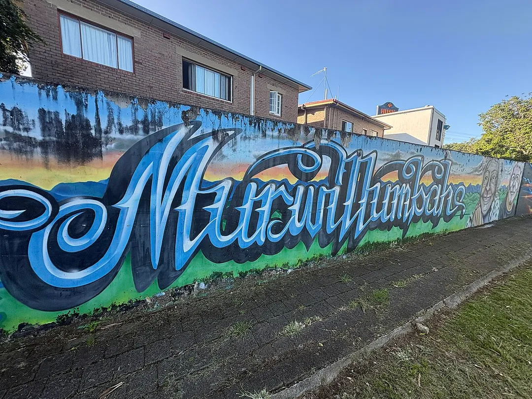 Murwillumbah flood levee wall welcoming people to Murwillumbah