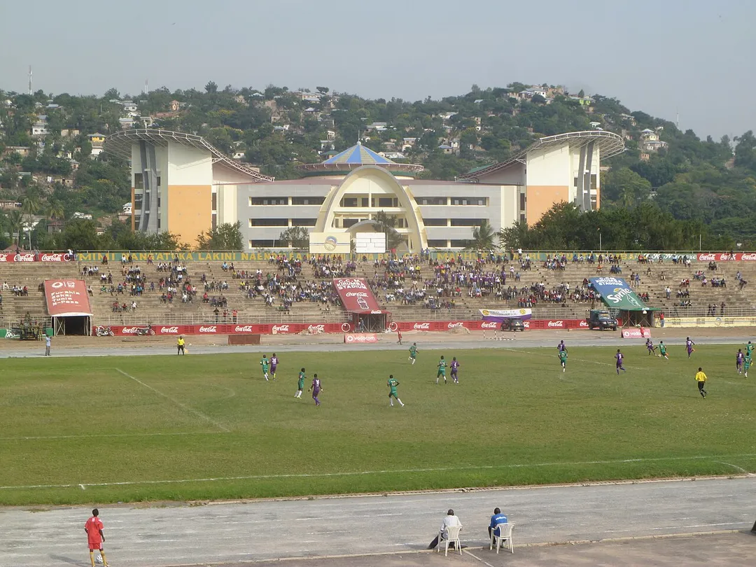 CCM Kirumba Stadium in Mwanza, Tanzania. During the Tanzanian Premier League match between Kagera Sugar and Mbeya City on January 17th 2015. Rock City Mall is seen in the background.