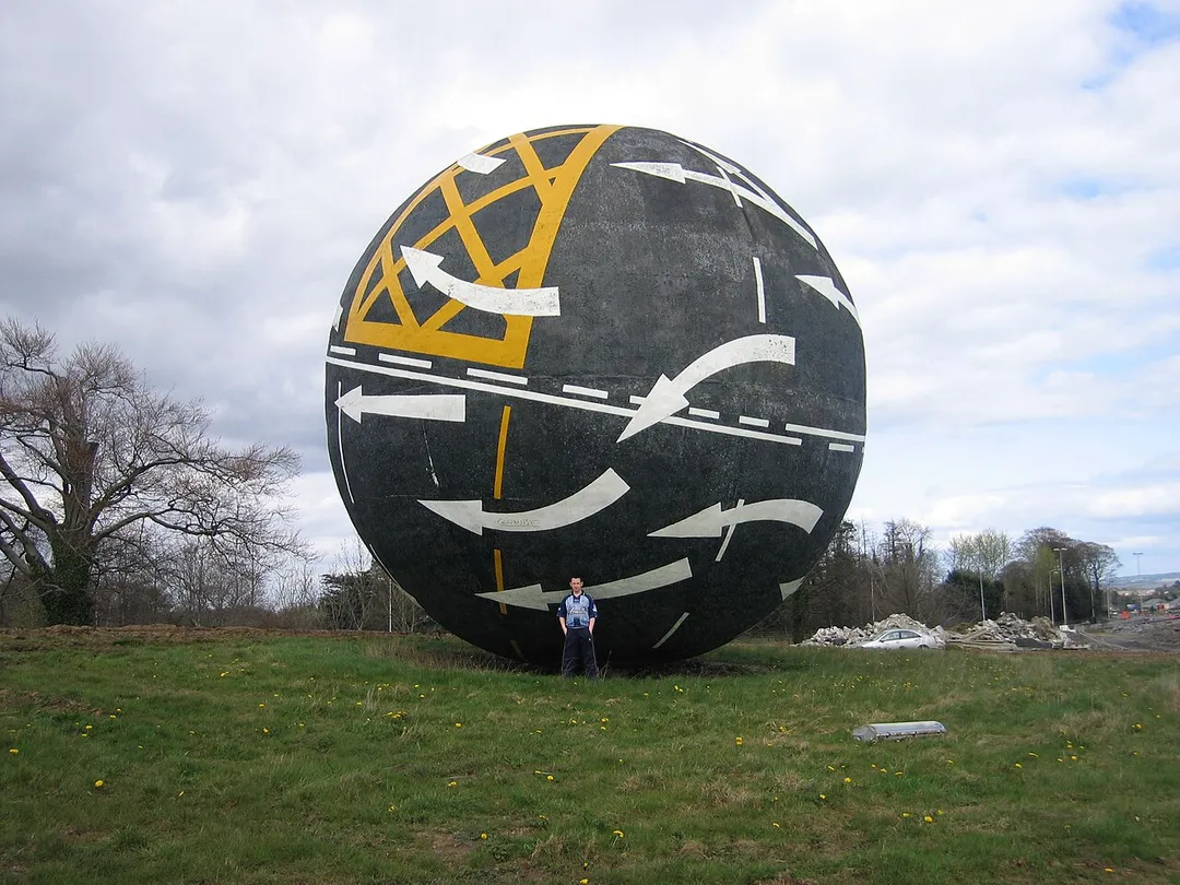 "Perpetual Motion", located at north end of Naas in Ireland. By-Pass; by Rachel Joynt and Remco de Fouw (1995). It is known locally as "The Big Ball".