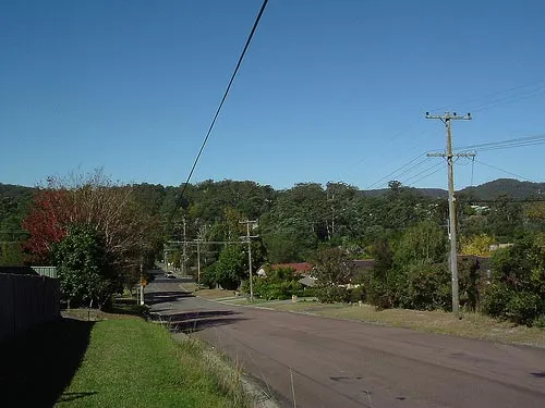 Looking down Deane Street towards the  train station in Narara, NSW, Australia. Available in high resolution at https://www.flickr.com/photos/ansend/131715858/