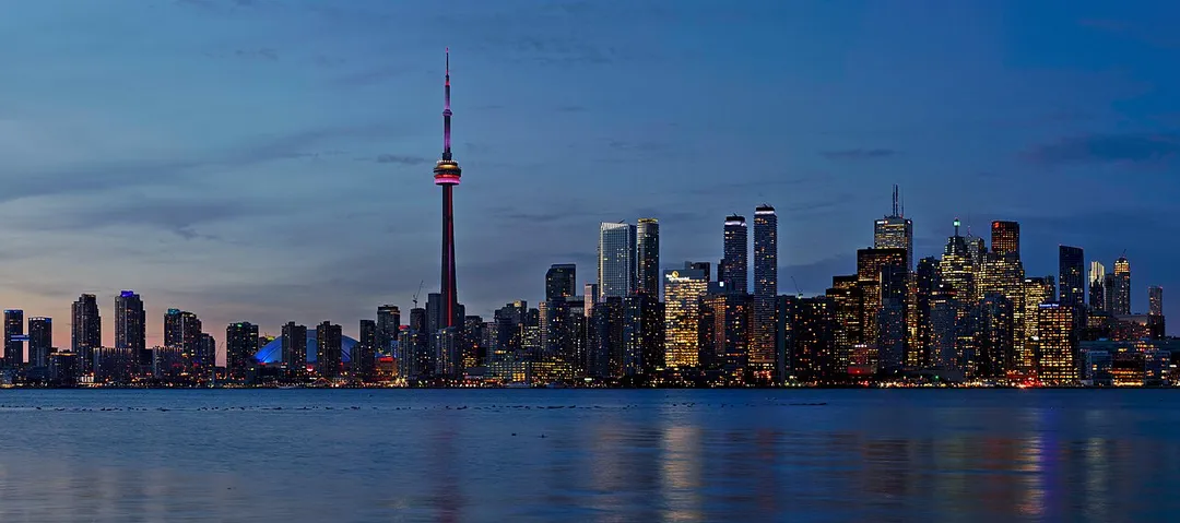 Picture of the Toronto skyline at sunset taken from the Snake Islands of the Toronto Islands. This is a crop of a larger panorama.