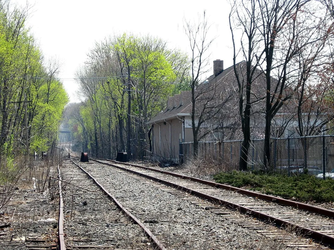 Looking south past former Erie train station and overpass of Franklin Avenue in Nutley on a sunny, springtime midday.
