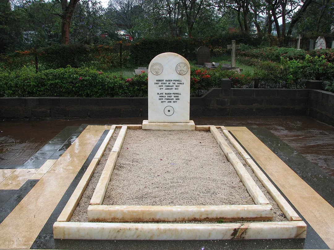 His gravestone bears a circle with a dot in the center, which is the Boy Scout trail sign for "I have gone home": Baden-Powell grave - w:Nyeri, Kenya, near Mount Kenya
