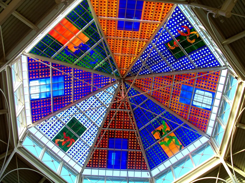 Oldham's "The Spindles" shopping centre features a stained glass window by Brian Clarke, designed celebrate the music of Sir William Walton.