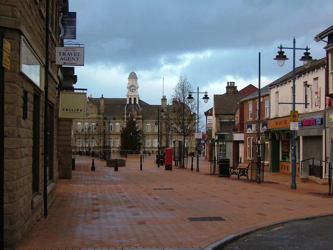 Photo I took myself of Ossett town centre in Yorkshire.  It shows the old Town Hall building and the pedestrianised area in front of it.  Taken on New Year's Day, 2005.