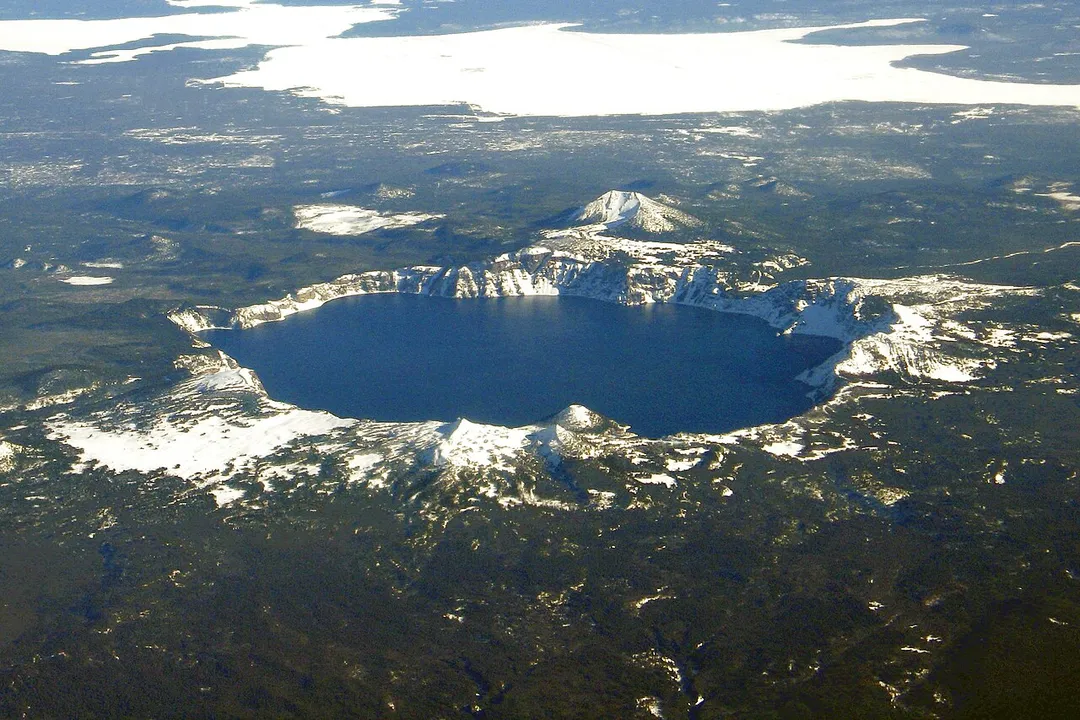 Aerial view, Crater Lake, Wizard Island, and Mount Scott, as seen from the west.