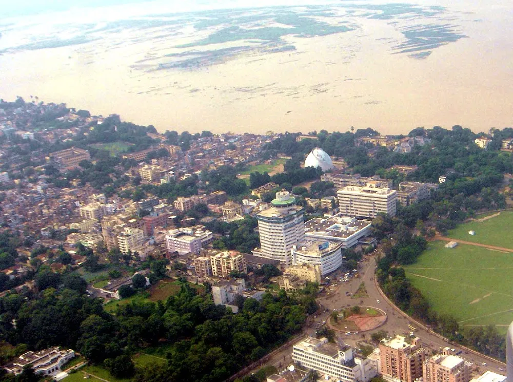 Aerial view of Patna. In the background, the damage to crops by the flooded ganges river can be seen. You can also see the 'Golghar' and the revolving restaurant