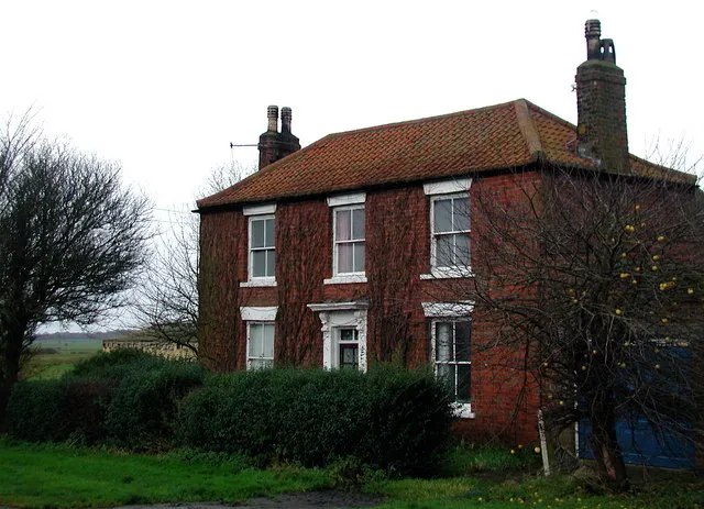 Mile House, Patrington, East Riding of Yorkshire, England.The farmhouse at Mile House, a large pig farm and feed mill on Hollym Road, Patrington, which is far enough away from everywhere else to have its own bus stop.