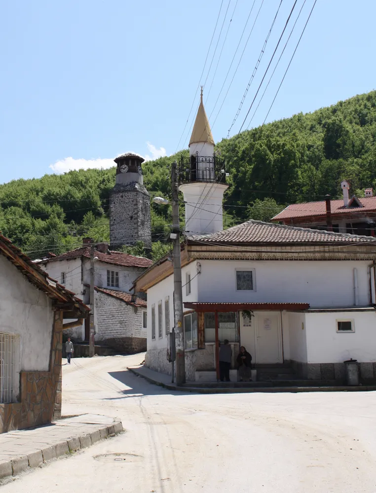 a 17th century clock tower and a new mosque, Peshtera, Bulgaria