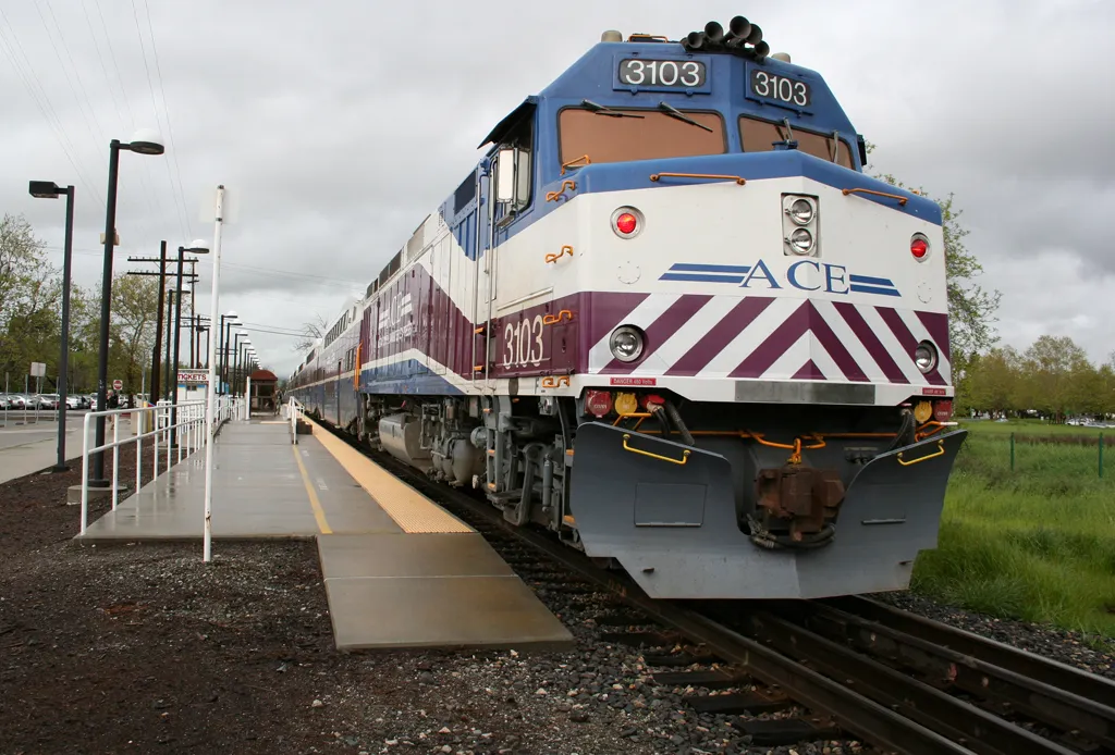 The Altamont Commuter Express train leaving Pleasanton station on the afternoon of March 22, 2005. Image created by Jay Slupesky using a Canon EOS 350D.