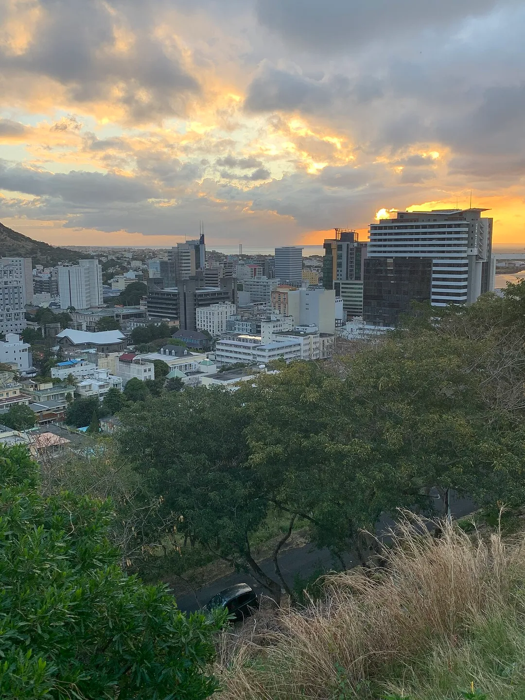 The skyline of Port Louis at sunset.