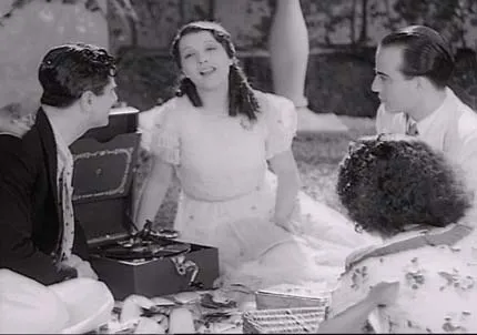 Fotografía de Libertad Lamarque y otros actores en la película Argentina Ayúdame a vivir (1936).
