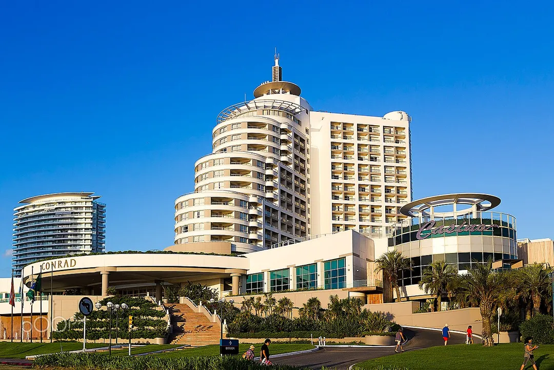 500px provided description: Conrad Punta del Este Resort &amp; Casino [#sky ,#landscape ,#city ,#people ,#street ,#travel ,#urban ,#architecture ,#building ,#beautiful ,#35mm ,#blue sky ,#las vegas ,#street photography ,#casino ,#urban exploration ,#Hotel]