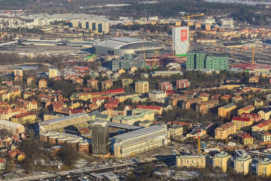 Råsunda, Solna Municipality in Stockholm County, Sweden. In the foreground 
Råsunda Stadium and in the background the new Friends Arena. Råsunda was Sweden's national football stadium 1937-2012. In November 2012 it was closed down and replaced by the new Friends Arena about 1 km from Råsunda Stadium. Flats and offices will be built on the old ground.
