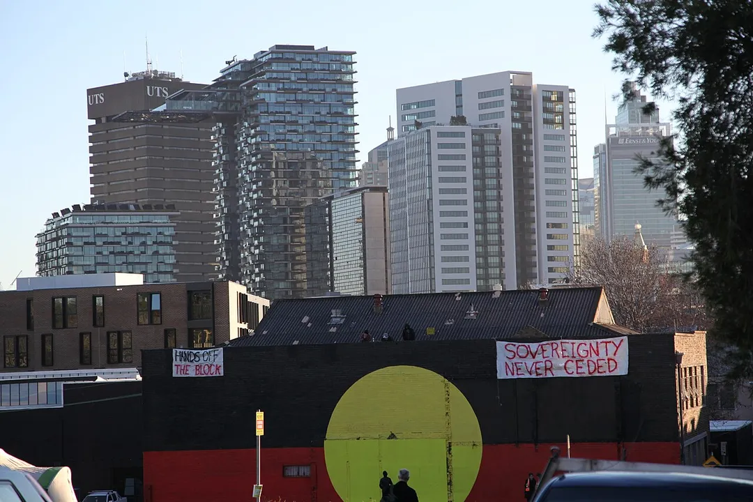 An Aboriginal flag on the side of the building