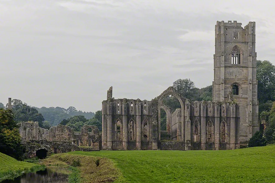 Fountains Cistercian Abbey showing the River Skell, Tower &amp; Chapel of Altars