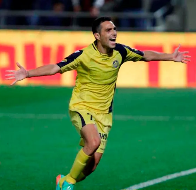 Maccabi Tel Aviv player Eran Zahavi celebrating.