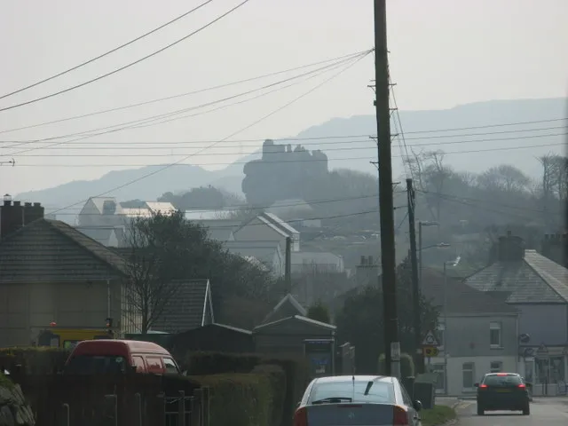 Roche Rock from Roche The China Clay hills around St.Austell in the distance