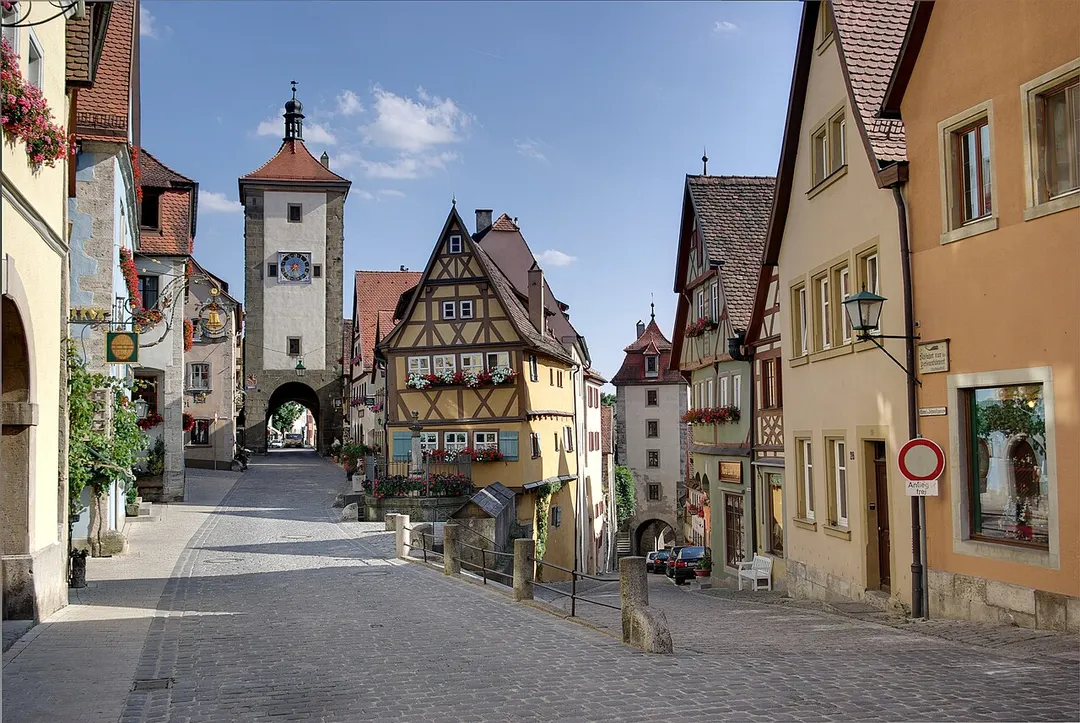 Rothenburg ob der Tauber, the place is called Plönlein a former marketplace, on the left side the Siebers-gate on the right the Kobolzeller-gate. This is one of the most photographed and painted places in Germany
