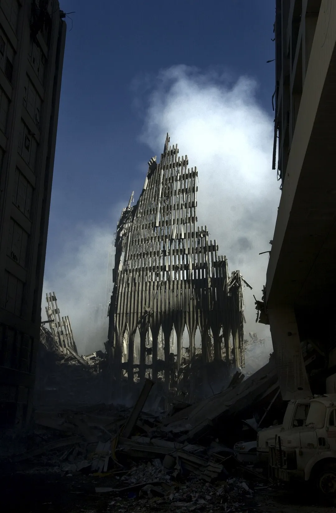 New York, N.Y. (Sept. 14, 2001) – What is left of the south tower of the World Trade Center in New York City, stands like a tombstone among the debris and devastation caused by the Sep. 11, terrorist attack.  U.S. Navy photo by Journalist 1st Class Preston.