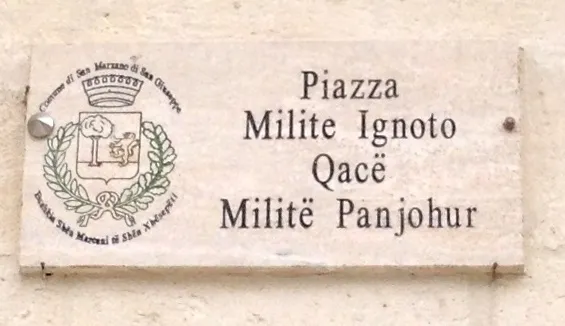 Bilingual place plate in San Marzano di San Giuseppe in Italian and in Arbëreshë (below)