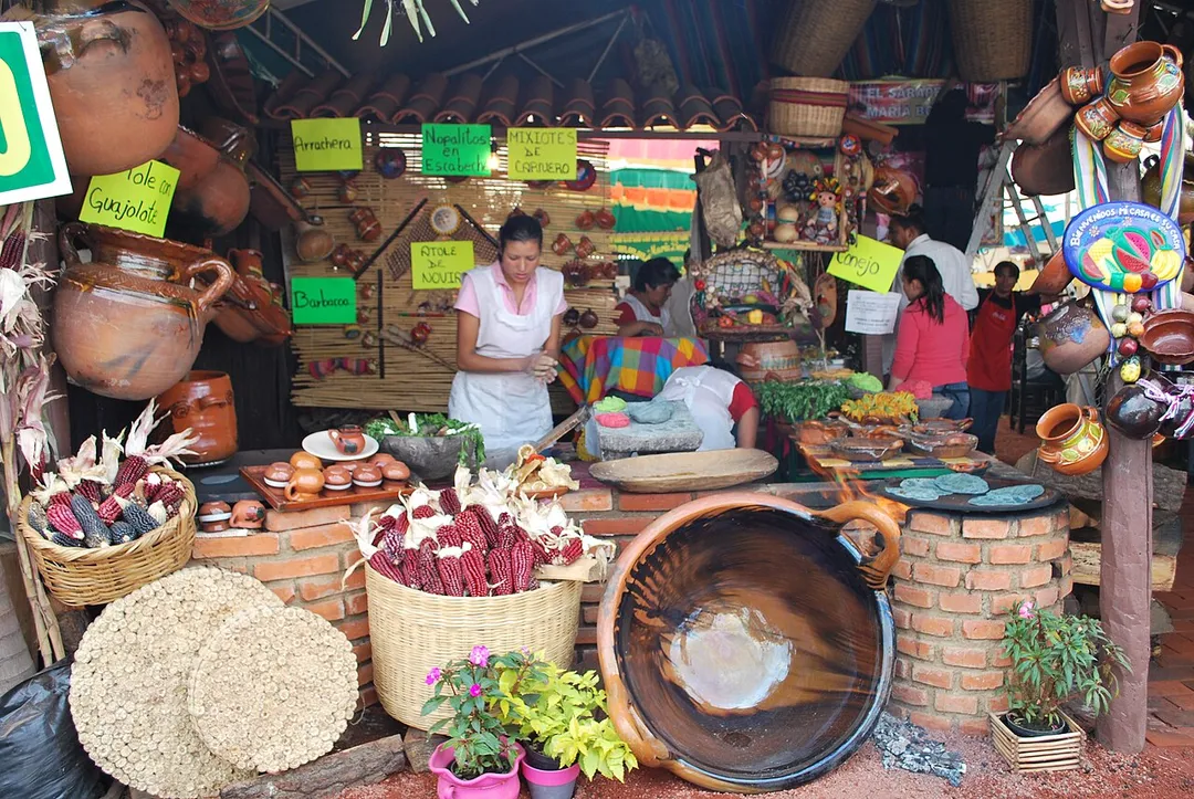 Woman making tortillas at one of the mole food stands at the Feria de Mole in San Pedro Atocpan, DF