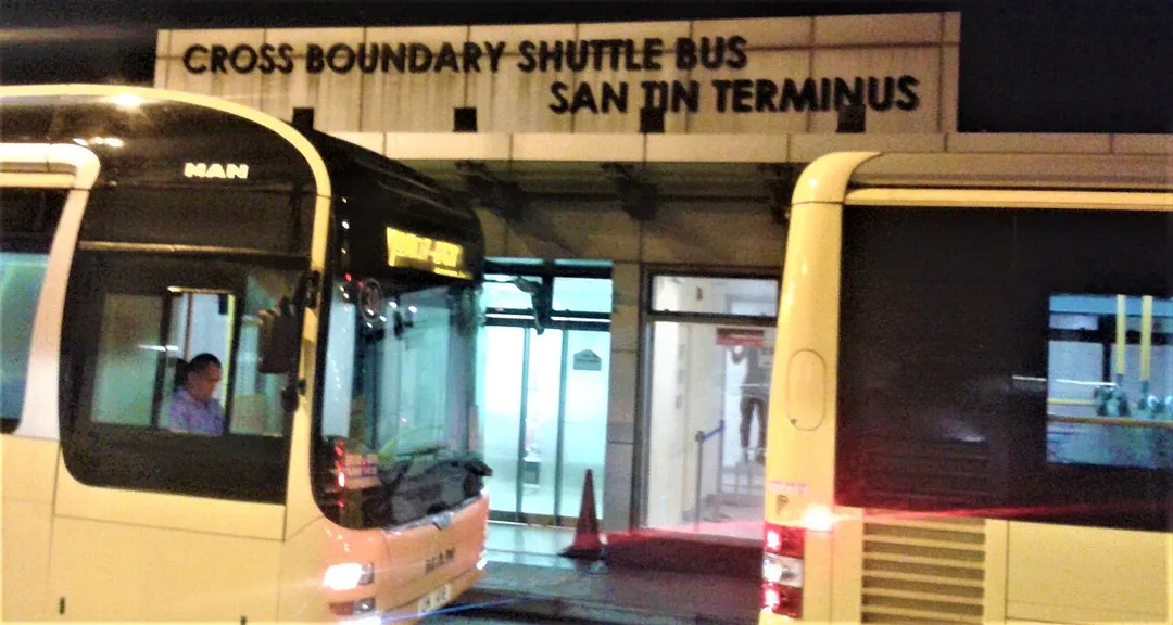 The Cross Boundary Shuttle Bus Terminus is at the core of San Tin Public Transport Interchange. The image shows the exit of the terminus to where the buses await passengers. The Terminus entrance is at the rear of the building.