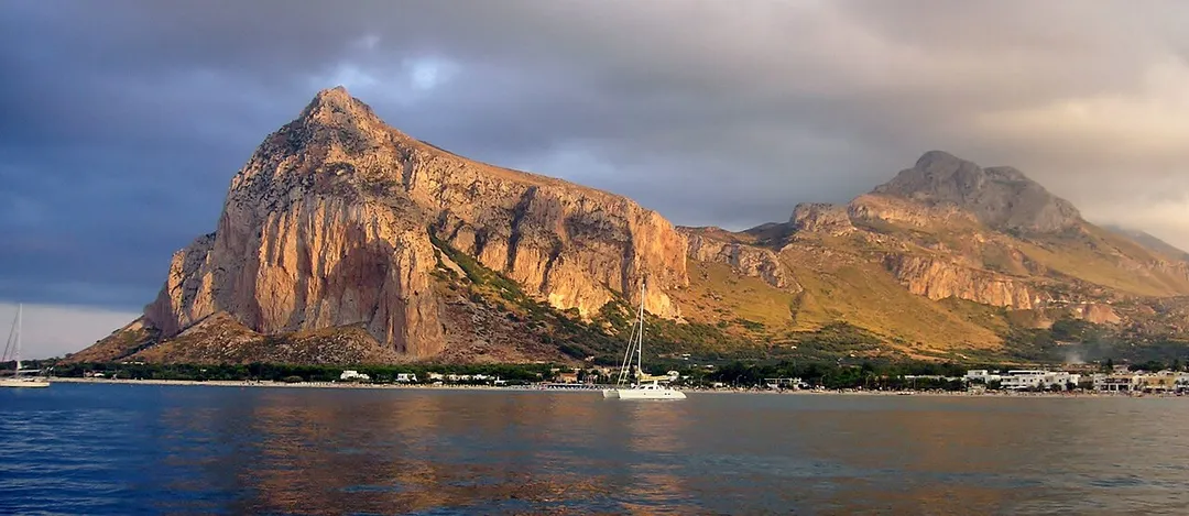 View from enter to San Vito La Capo marina, showing coast of city and mountains behind of it.
San Vito Lo Capo,
Sicily,

Italy