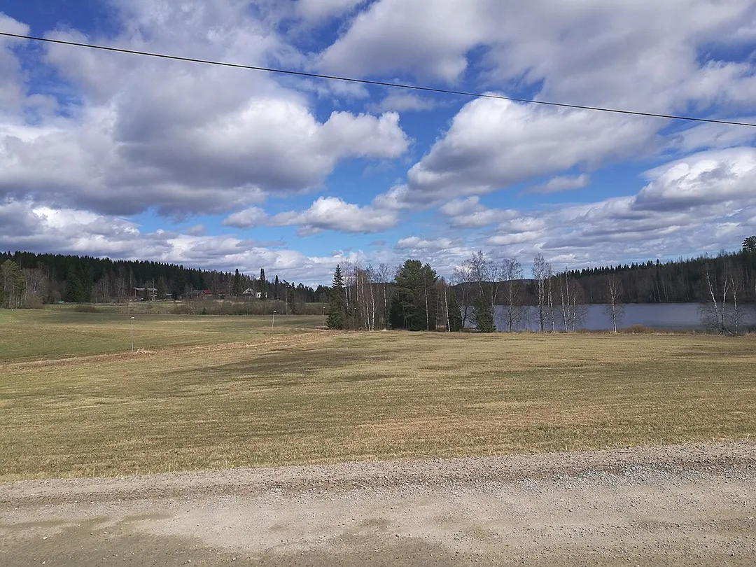 View along the road Kuusjärventie in Saukkola, Korpilahti (Jyväskylä), Finland.