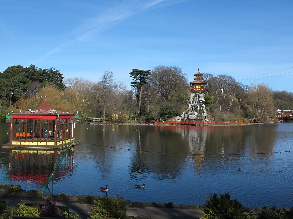 The bandstand is unusually located on a structure in the lake, and players have to rowed out to it. To the right is the island with its pagoda (a modern rebuild).