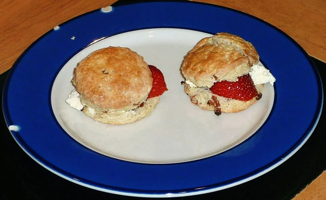 Scone with cream and strawberries